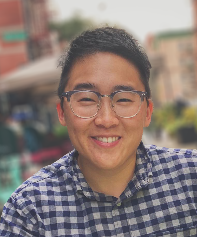 noa kim photo copy Noa Kim smiling wearing glasses and checkered shirt