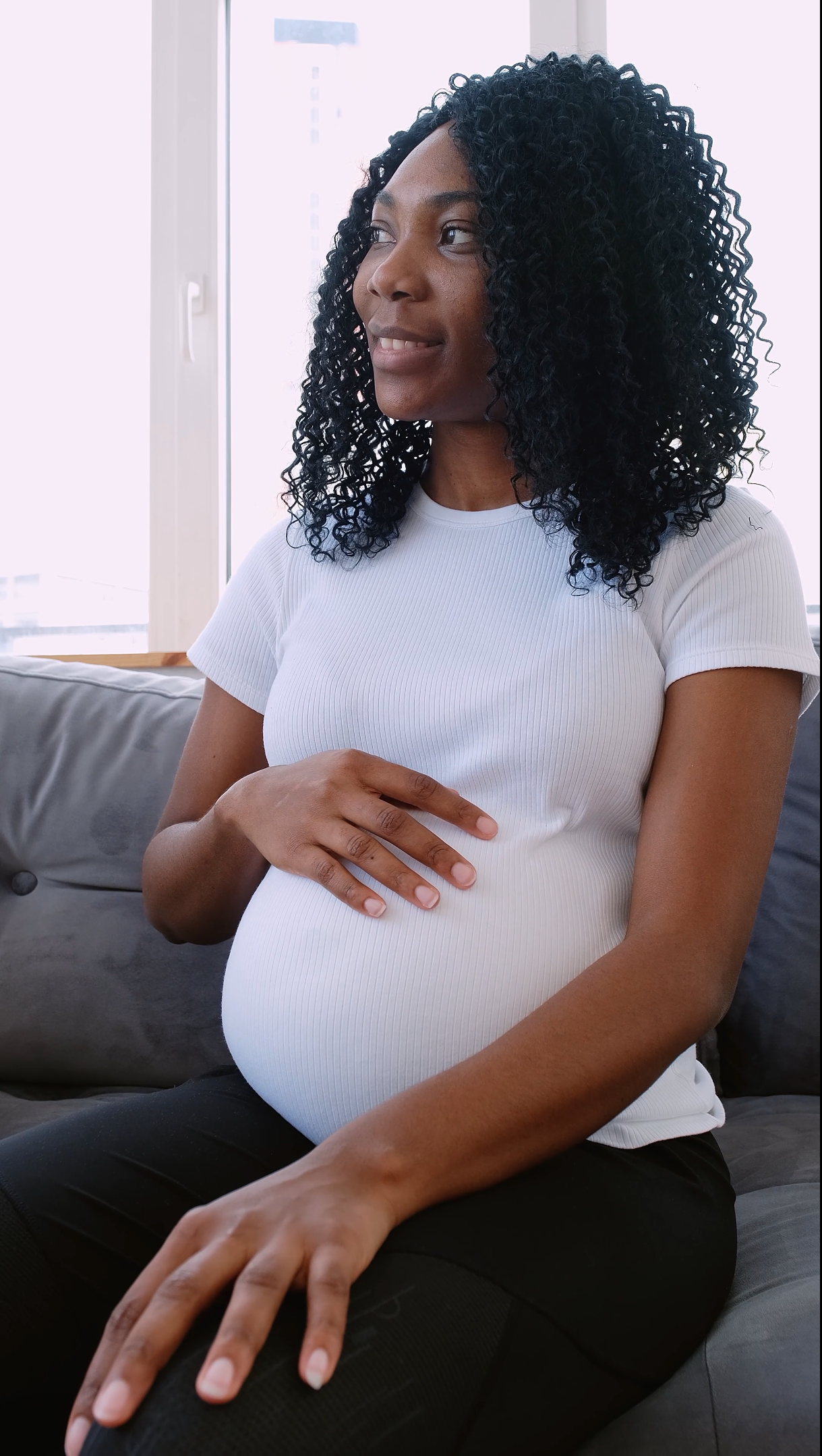 pexels still black pregnant woman smiling Black pregnant woman holds belly smiling